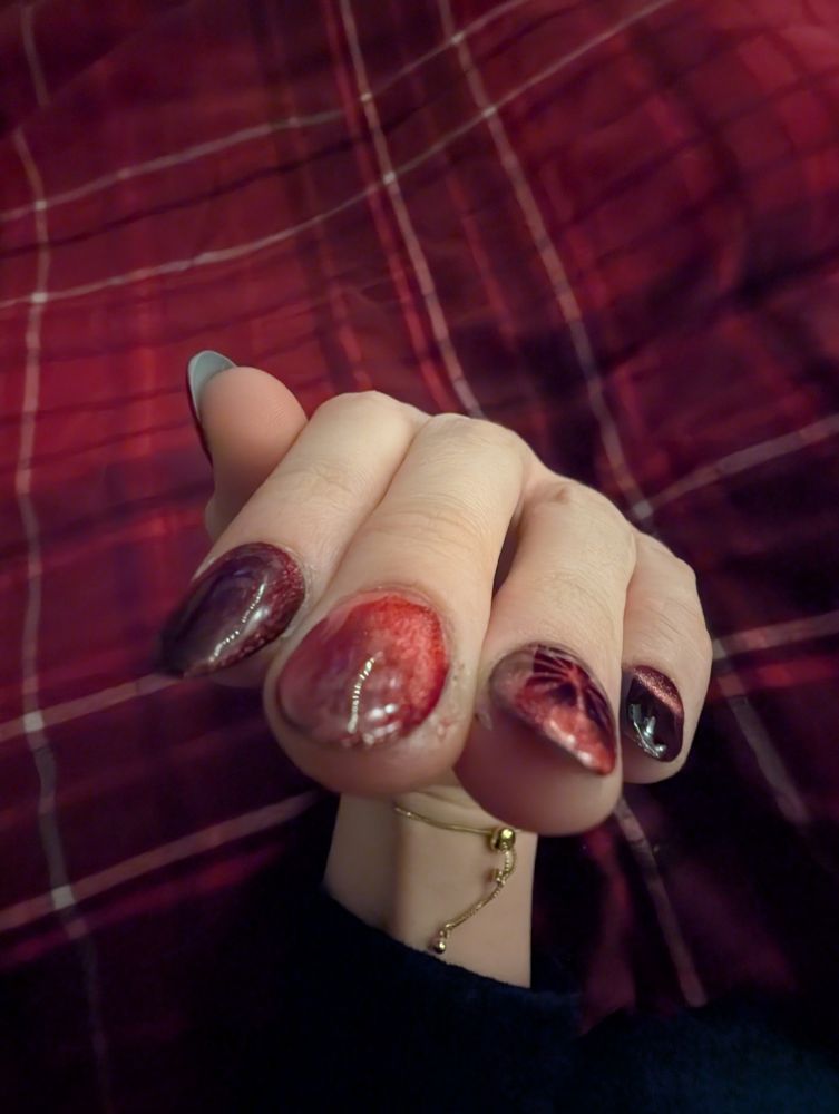 0.5 image of red nails