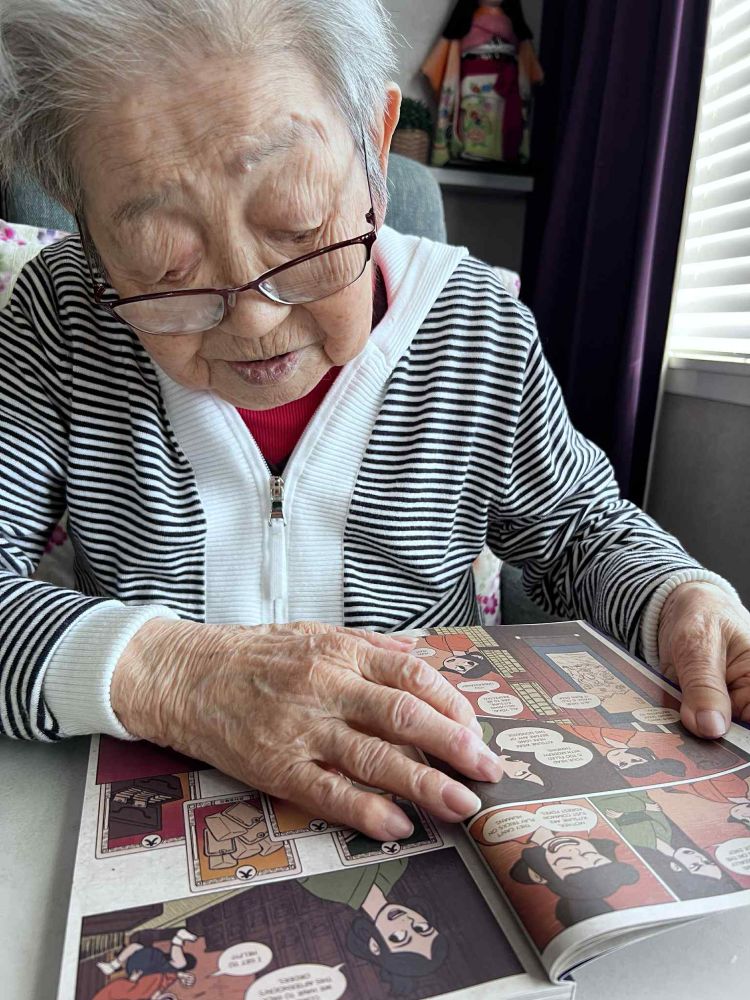 My grandmother Taeko reading a copy of Folk Remedy book 1