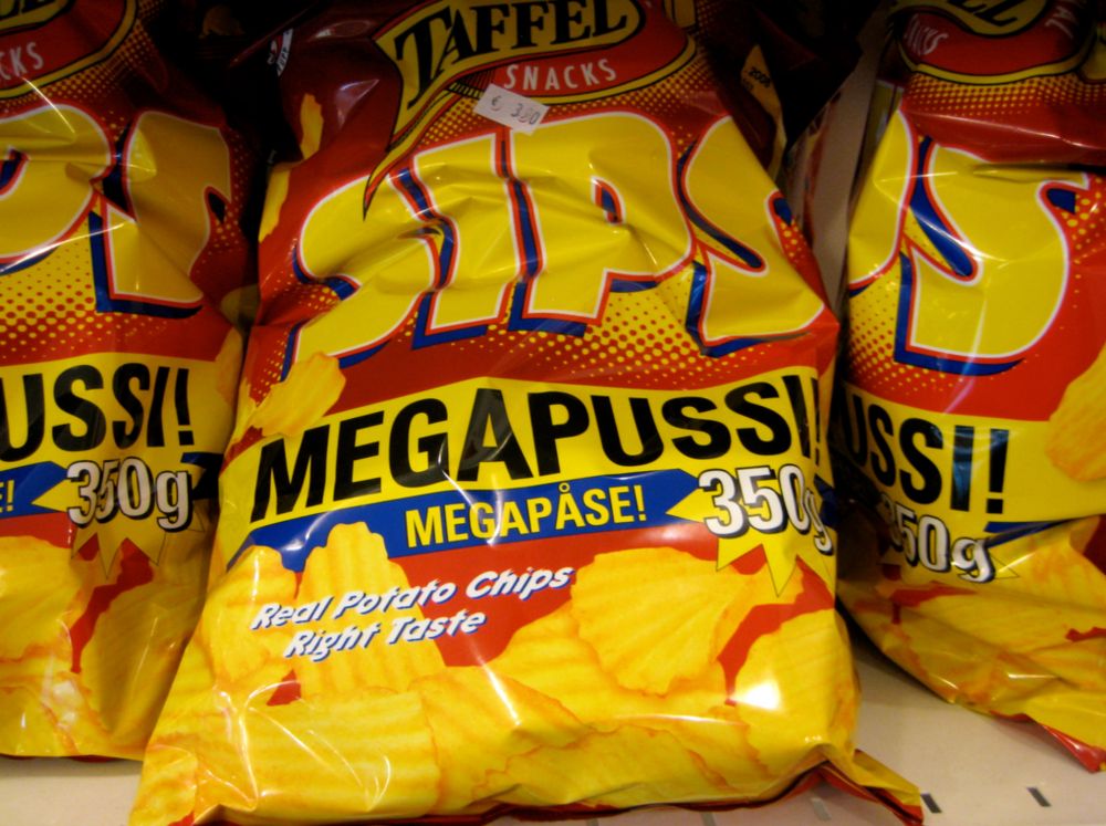 A bag of Taffel potato crisps with text "MEGAPUSSI!" (which means "megabag"). Unfortunately the marketing people at Taffel did not understand the meme potential and we no longer have megapussi crisps available, only "big time" size which sadly is considerably smaller than the megapussi.
