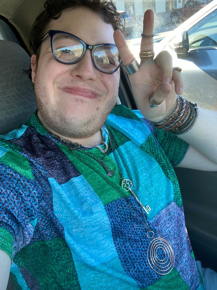 Picture of me doing the peace sign whilst smiling