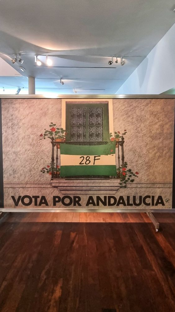 An image of a Andalucian flag with the motto "vote for Andalucia" from the electoral campaign of the 1980 referendum campaign which resulted in autonomy within democratic Spain