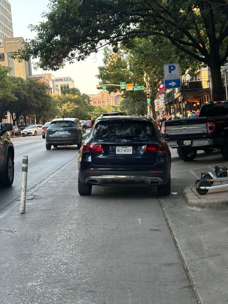 Car parked in bike lane
