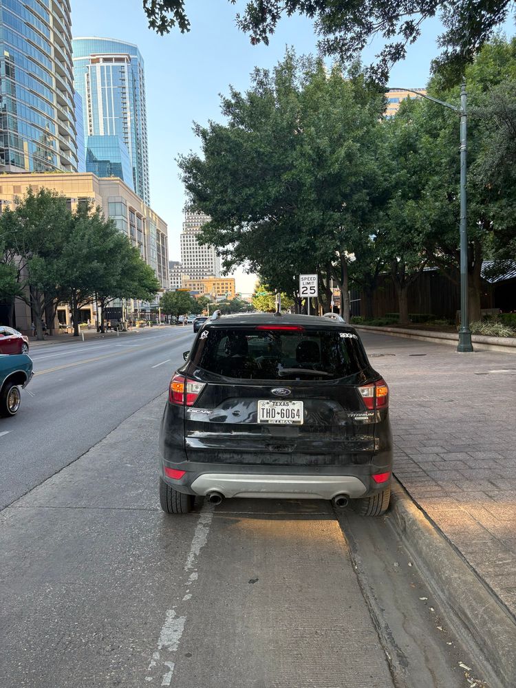 Car parked in bike lane