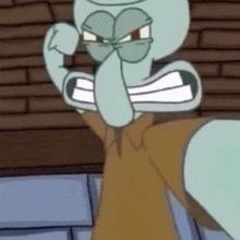 Squidward grimacing with a raised fist, ready to throw a punch
