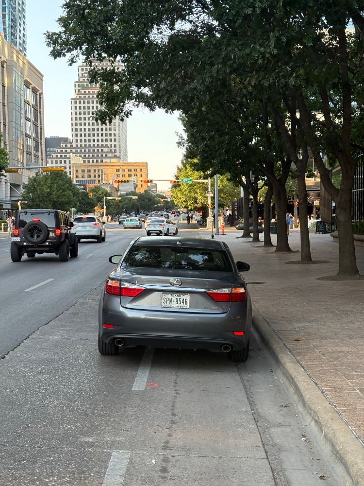 Car parked in bike lane