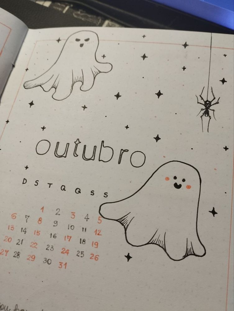 Desenho de outubro com dois fantasmas desses de lençol branco, fazendo carinhas fofinhas. À direita, uma aranha simples divide espaço. 