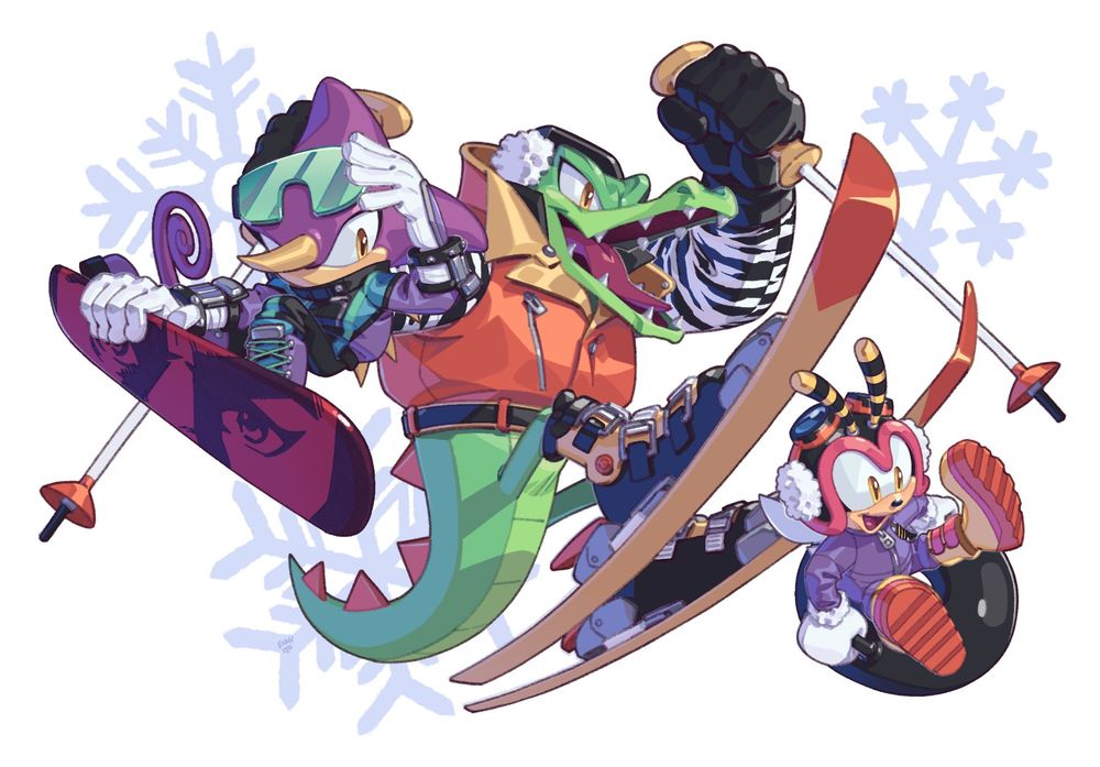 Color illustration of the Chaotix with snow sport gear; Espio wears a purple and black snowsuit and rides a snowboard. Vector has skis and an orange jacket. Charmy is in a purple snowsuit and rides an inner tube sled.