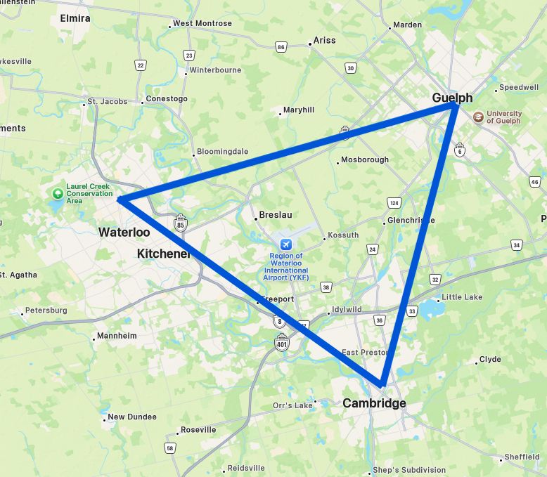 Map of Waterloo Region and Guelph with blue lines drawn between Waterloo/Kitchener/Cambridge, Cambridge to Guelph, and Guelph to Waterloo forming a triangle