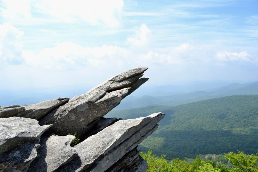 Jagged rocks, pointing upward

Rough Ridge Lookout
Blueridge Parkway, NC

https://www.romanticasheville.com/rough_ridge.htm