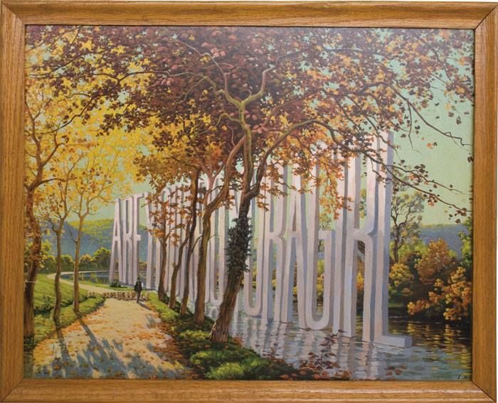 one of those fake painting lithographs or a landscape that you see in thrift stores. in it are some trees and a sunlit pathway next to a river. floating down the rivers are massive block letters: "ARE YOU A BOY OR A GIRL"