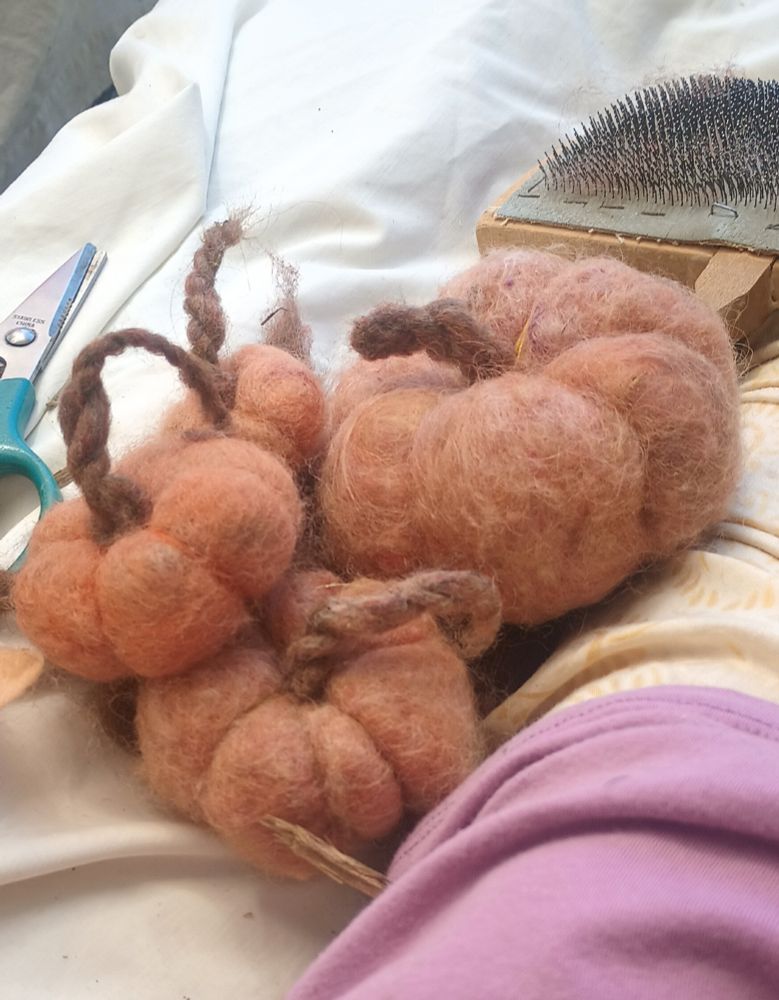 Four Needed felted pumpkins of various sizes 