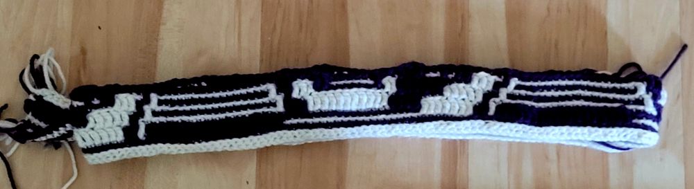 a partially completed mosaic crochet strip