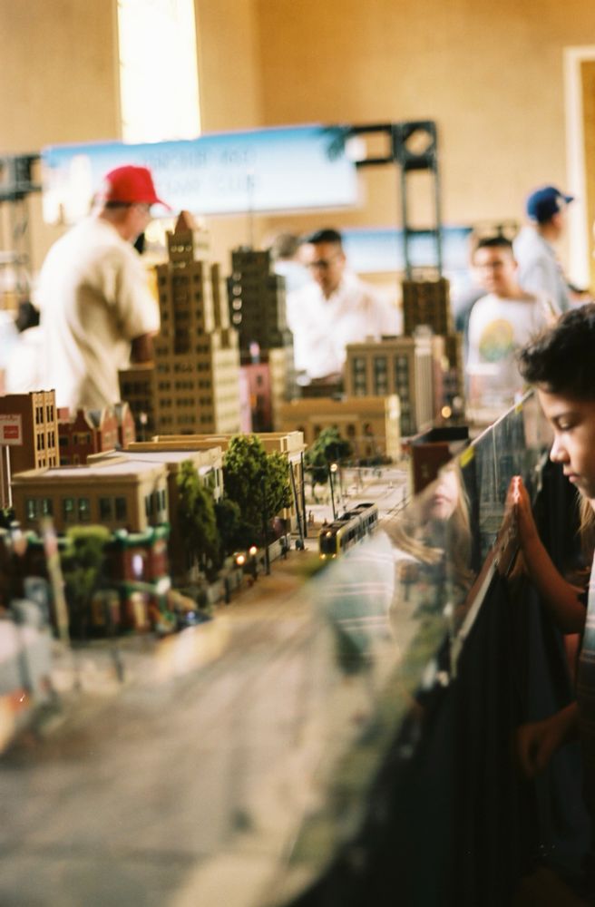 A child watches a model train 