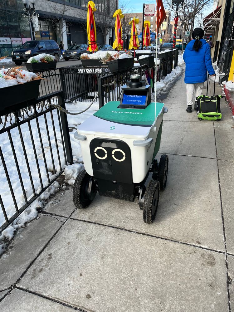 one of those fuck ass delivery robots on the sidewalk in chicago 
