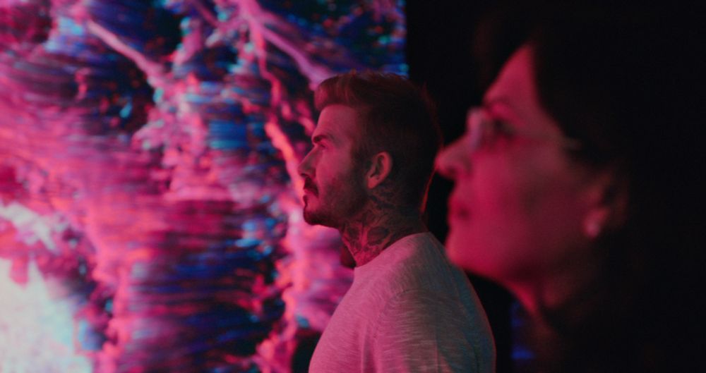 David Beckham looks an a digital artwork about Malaria