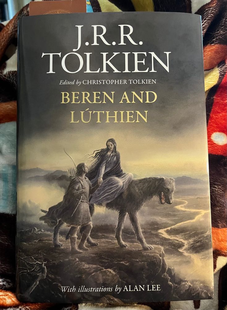 Book cover of Tolkien’s Beren and Lúthien, showing Beren walking alongside Huan the hound who has Lúthien riding on his back.