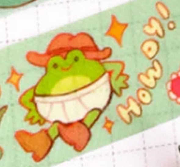 A cartoon frog wearing cowboy boots and cowboy hat