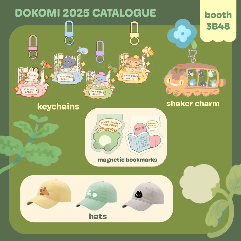 Artist alley catalogue page: keychains of little animals tending to their artist alley tables, a catbus shaker charm, magnetic bookmarks featuring a "frogetful" frog and a bookworm, and three different hats with embroidery of capybara, ghosts and a black cat, respectively