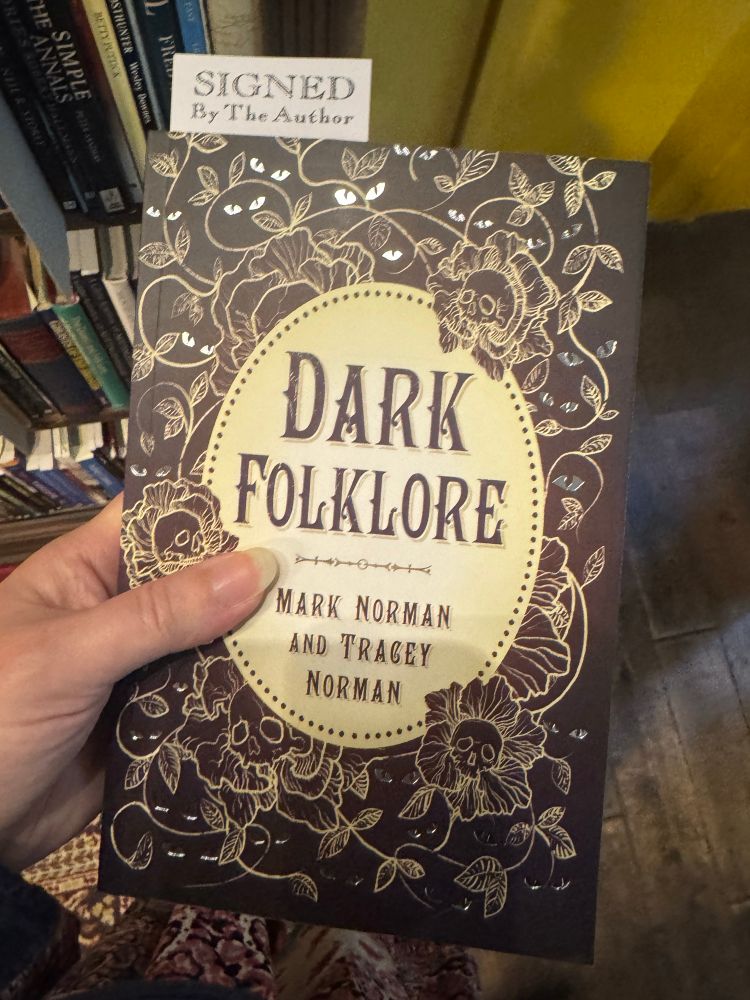A copy of Dark Folklore by Mark and Tracey Norman, signed by the authors on 23.11.25 at Treadwell's Books. 