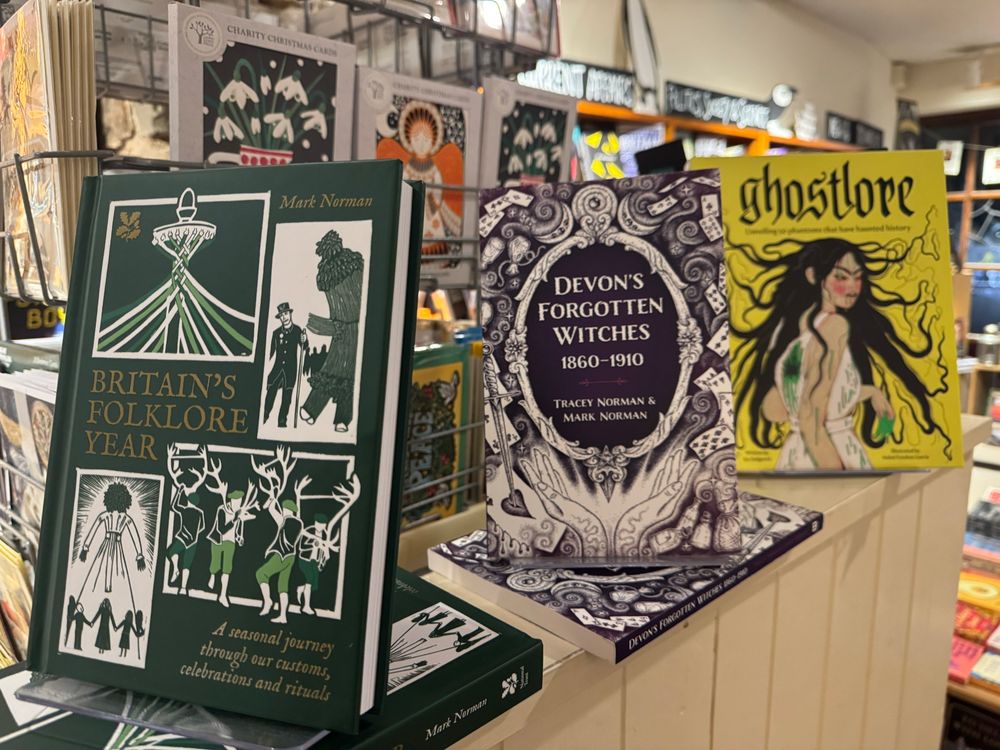 A 'shelfie' featuring Britain's Folklore Year' by Mark Norman, 'Devon's Forgotten Witches 1860-1910' by Tracey Norman and Mark Norman, and 'Ghostlore' by Icy Sedgwick, all on display in The Bookery, Crediton's independent bookstore. 