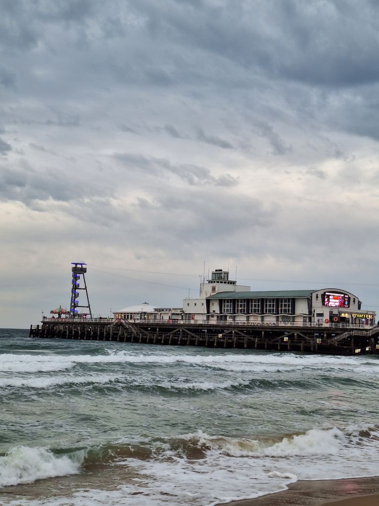 Bournemouth Pier over crashing waves 