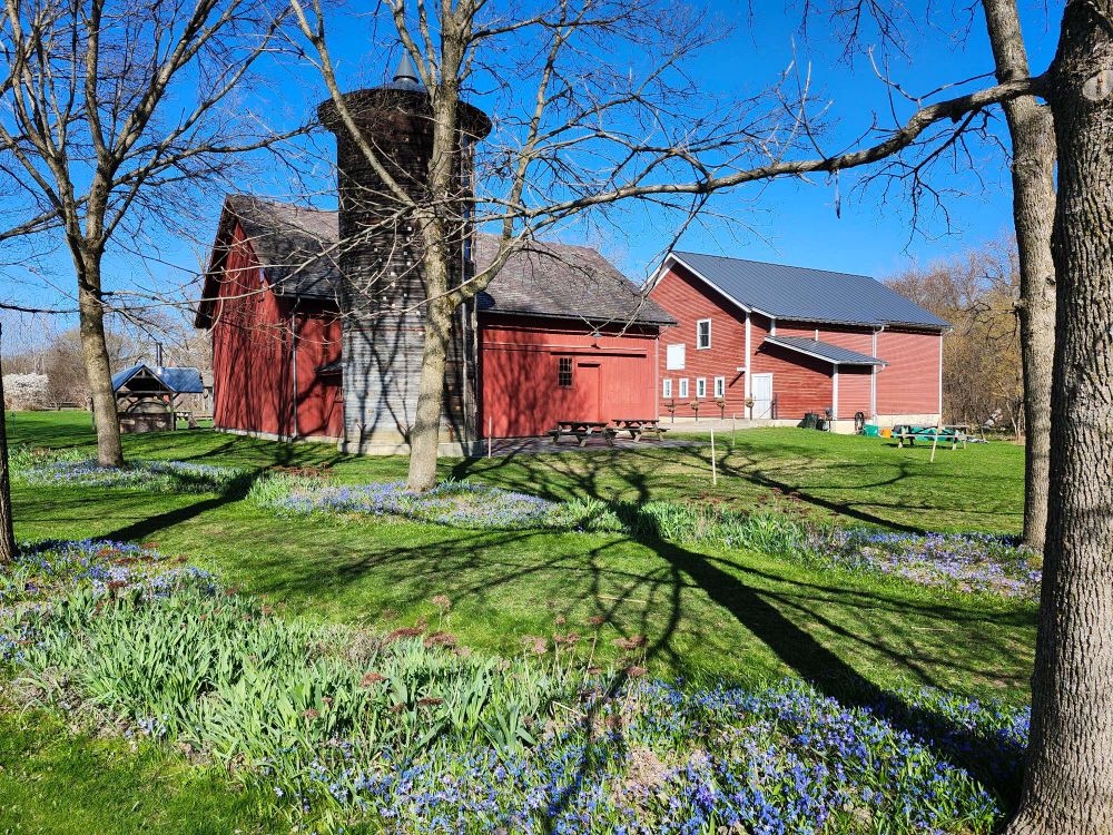 View of red farm buildings