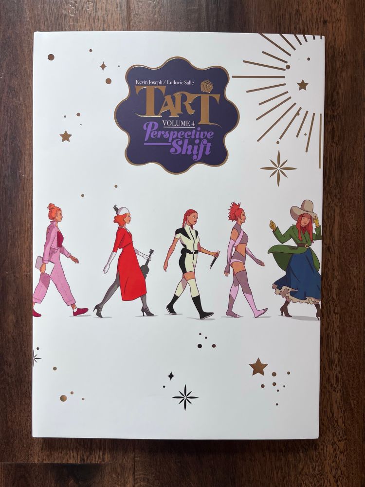 The front cover of Tart Vol 4 showing Tart Acid in many of the outfits she’s worn throughout the 16 issues published so far. 

