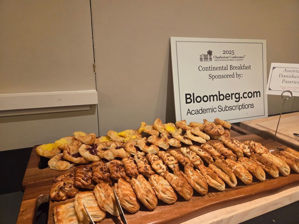 Pastries and sponsorship sign