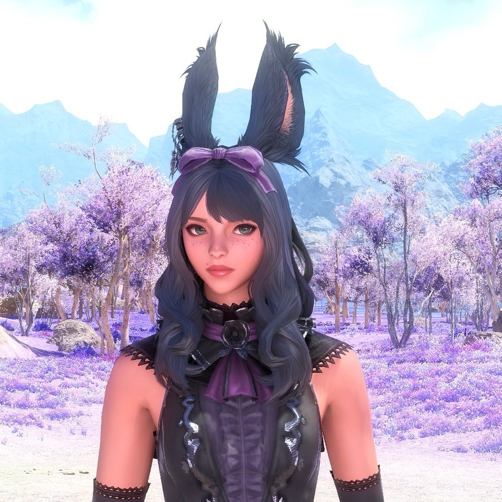 A picture of my WoL Viera, staring at the camera with a slightly concerned expression. She’s wearing dark purple/black clothes and a purple bow on her head.