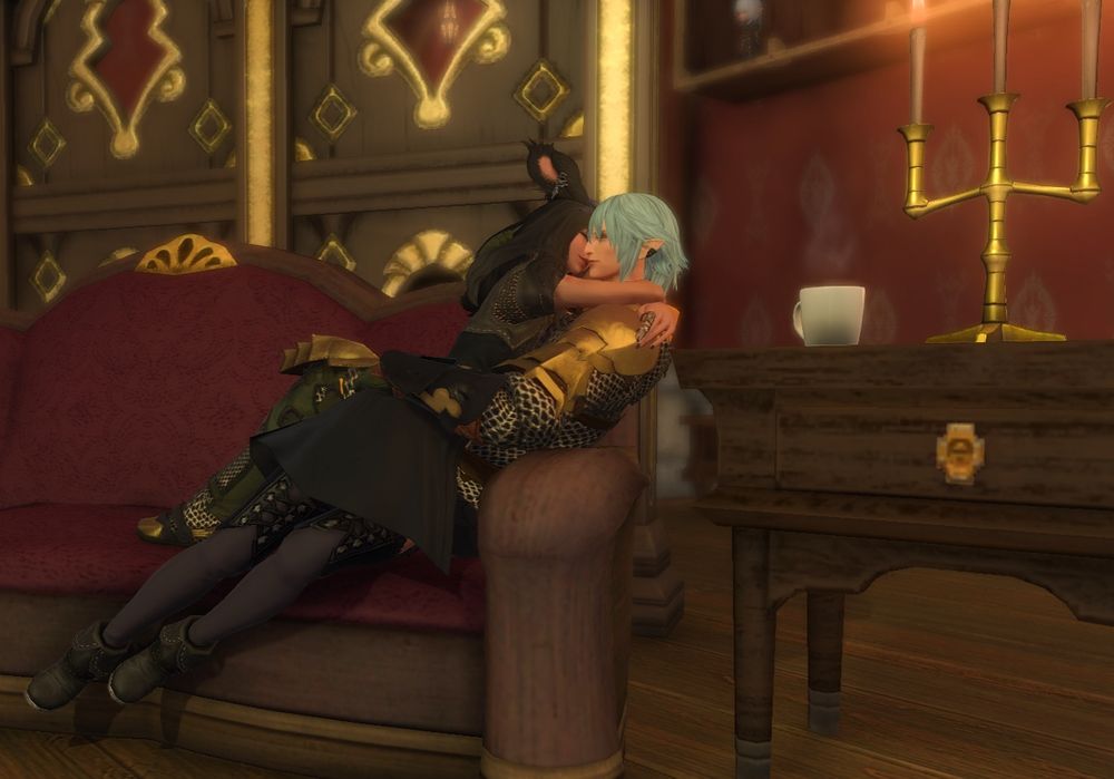 An old gpose. Haurchefant is holding my WoL Viera in an embrace while lying back on the couch. There is a white coffee cup and a candelabra next to them on a table stand. There is a little bit of steam emerging from the white cup. 