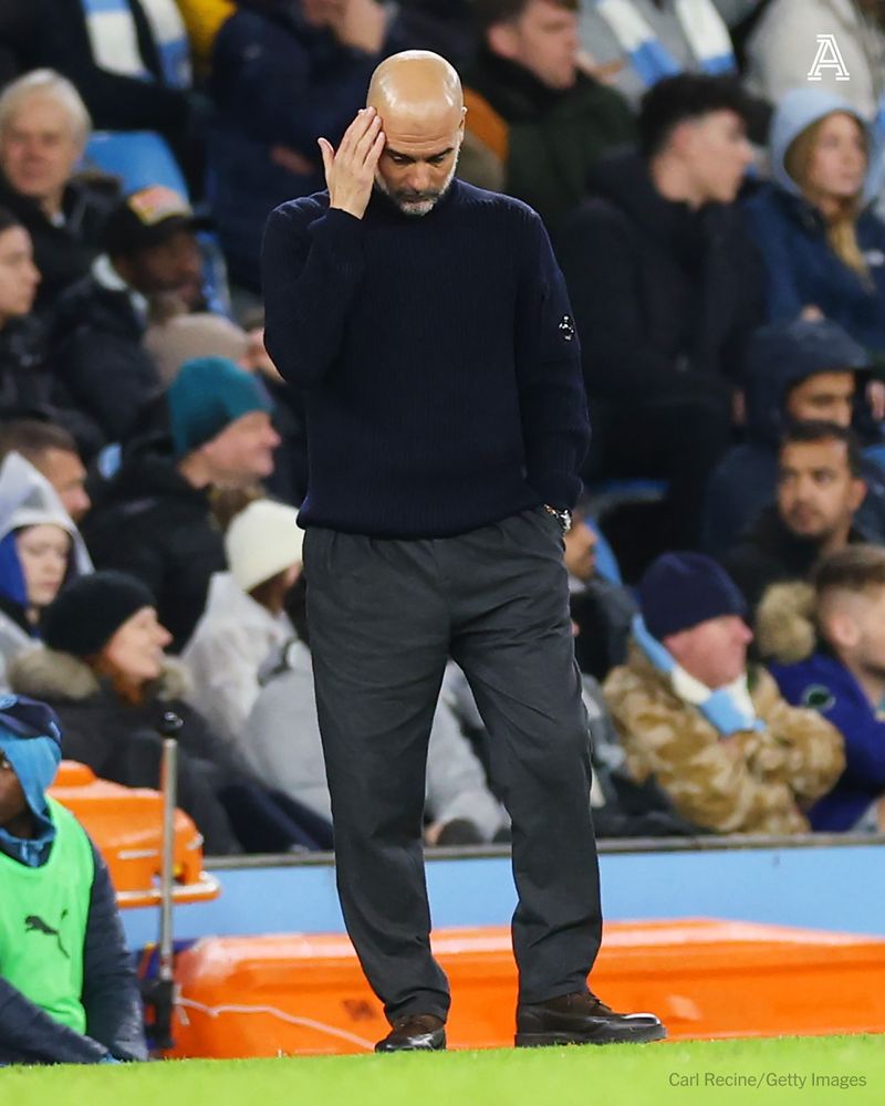Pep Guardiola looks dejected
