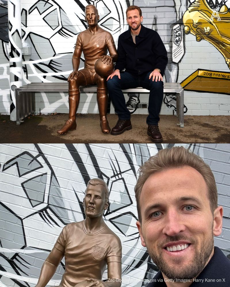 Harry Kane posing with his statue