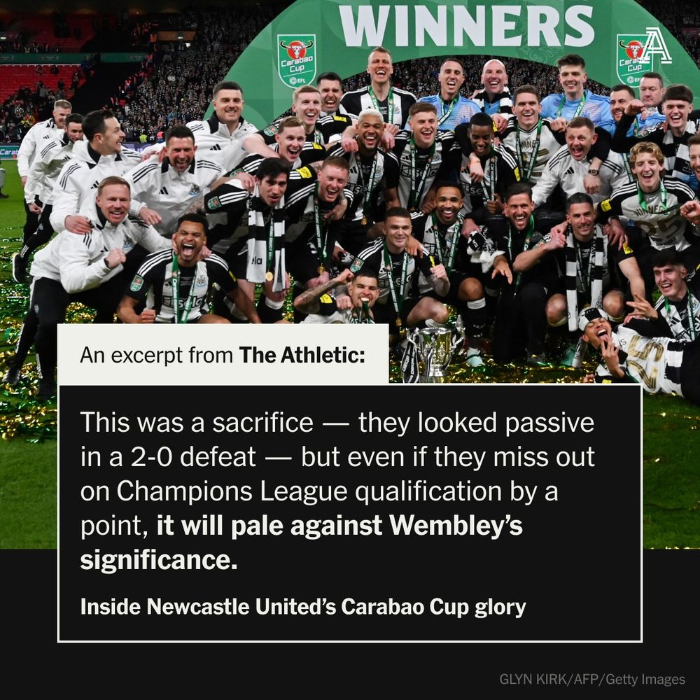 Newcastle United's players celebrate with the League Cup trophy after winning the English League Cup final football match between Liverpool and Newcastle United at Wembley Stadium