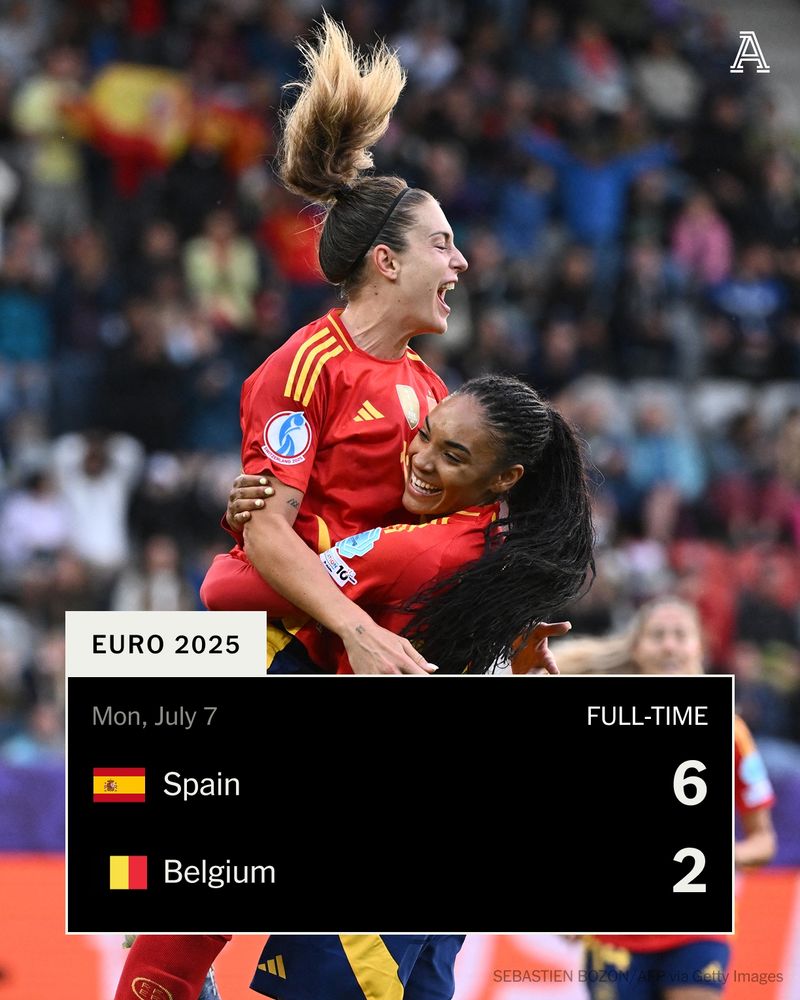 Spain's midfielder #11 Alexia Putellas (L) celebrates with Spain's forward #18 Salma Paralluelo after scoring her team's sixth goal during the UEFA Women's Euro 2025 Group B football match between Spain and Belgium at the Arena Thun stadium in Thun on July 7, 2025.