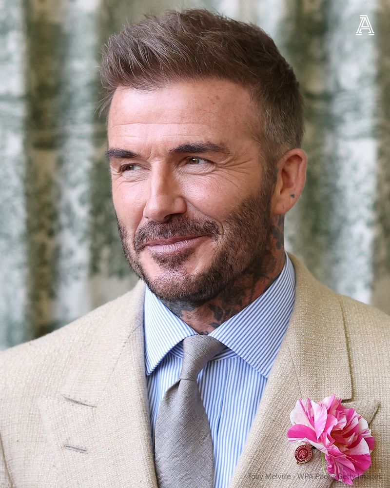 David Beckham wearing a David Austin Roses "King's Rose" waits to meet the King during a visit to the RHS Chelsea Flower Show at Royal Hospital Chelsea on May 20, 2025 in London, England.