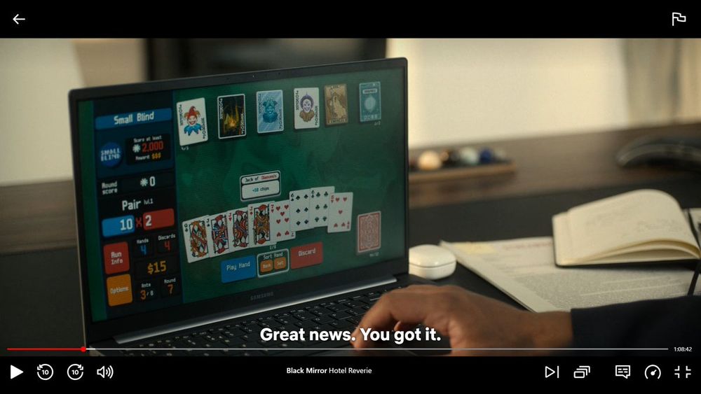 a screenshot showing balatro in black mirror, specifically the hotel reverie episode.