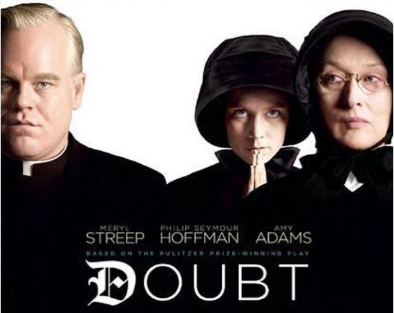 Poster for the 2008 film, Doubt, with, from left to right, Phillip Seymour Hoffman as a priest and Any Adams and Meryl Streep as nuns, all dressed in black, with hints of white and a plain white background. The text is in white giving the name of the film and actors and saying that it was based on "The Pulitzer Prize winning play".