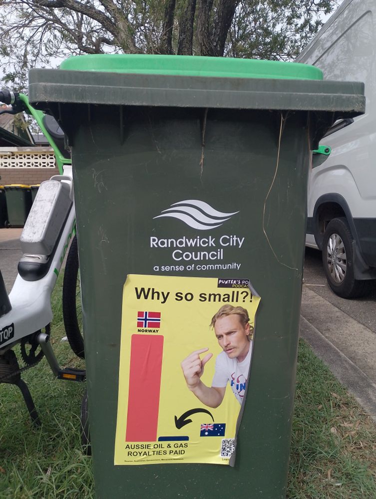 Green-lid bin with big sticker from Punters Politics 