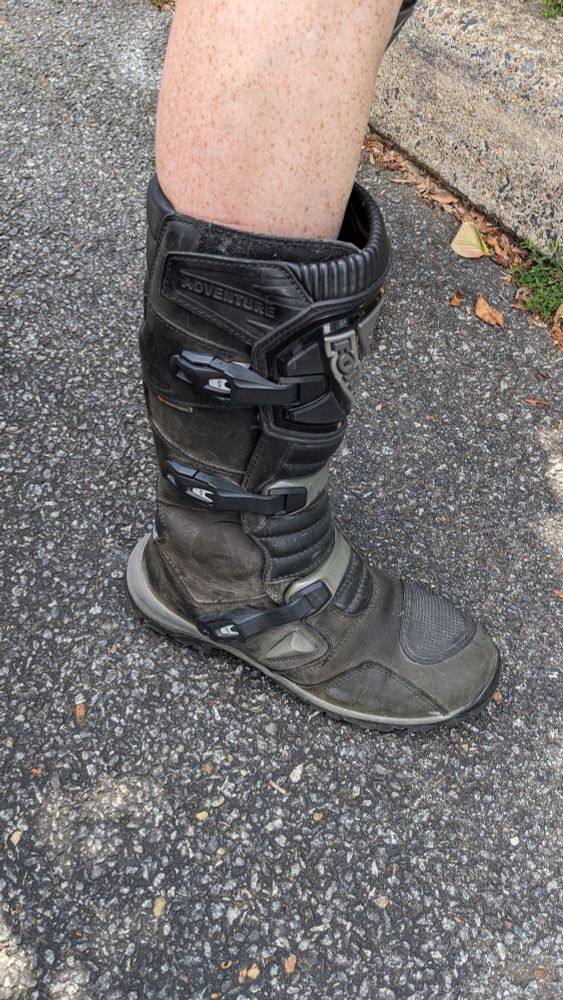big old black motorcycle boot for off road touring