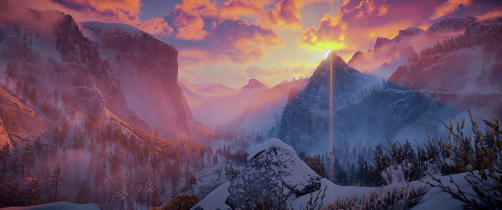 A screenshot from Horizon Zero Dawn: Forbidden West recreating the famous tunnel view photograph of Yosemite National Park taken at dawn. 