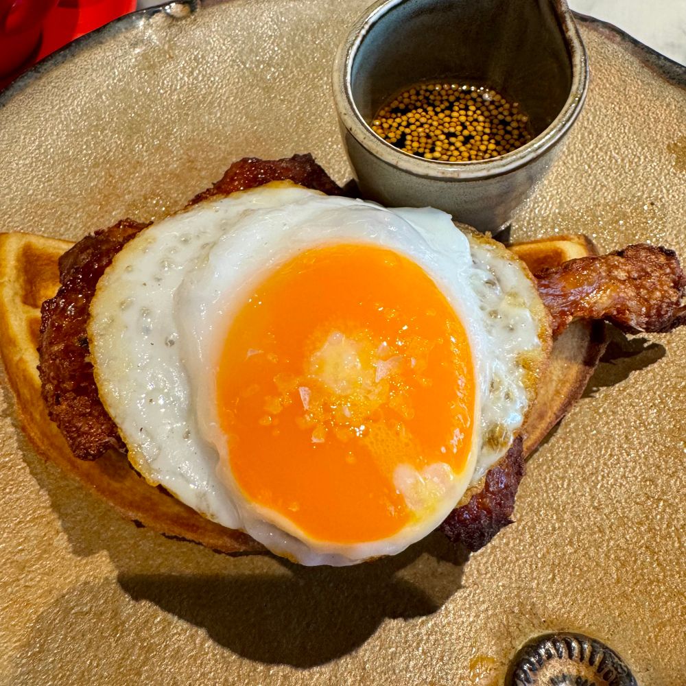 Duck, waffles, & an egg