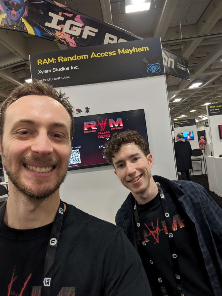 Me (left) and my co-director Andrew Cunningham (right) at our IGF Booth!