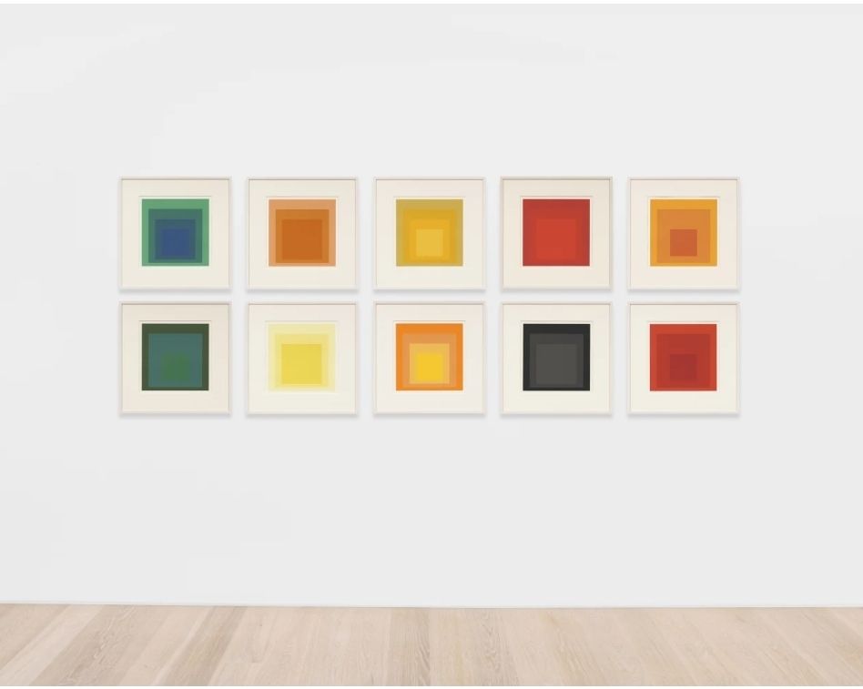 Two rows of five prints on a wall. Each is of a square within a square within a square, with variations in colour and size.