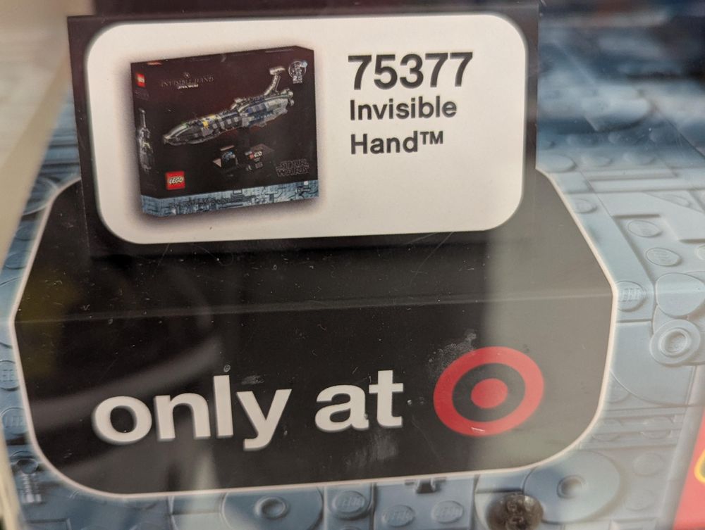 A Lego kit called the "Invisible Hand", immediately followed by an "only at Target" badge 