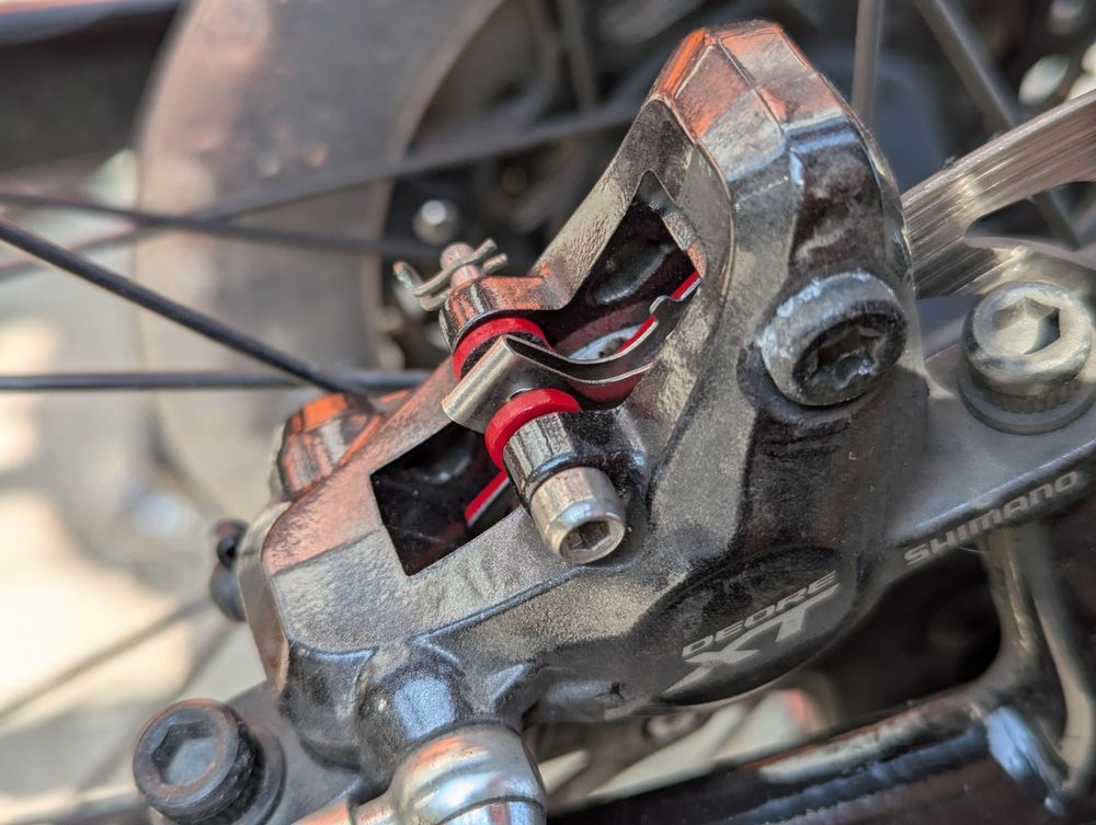 My rear brakes with little red cleats.