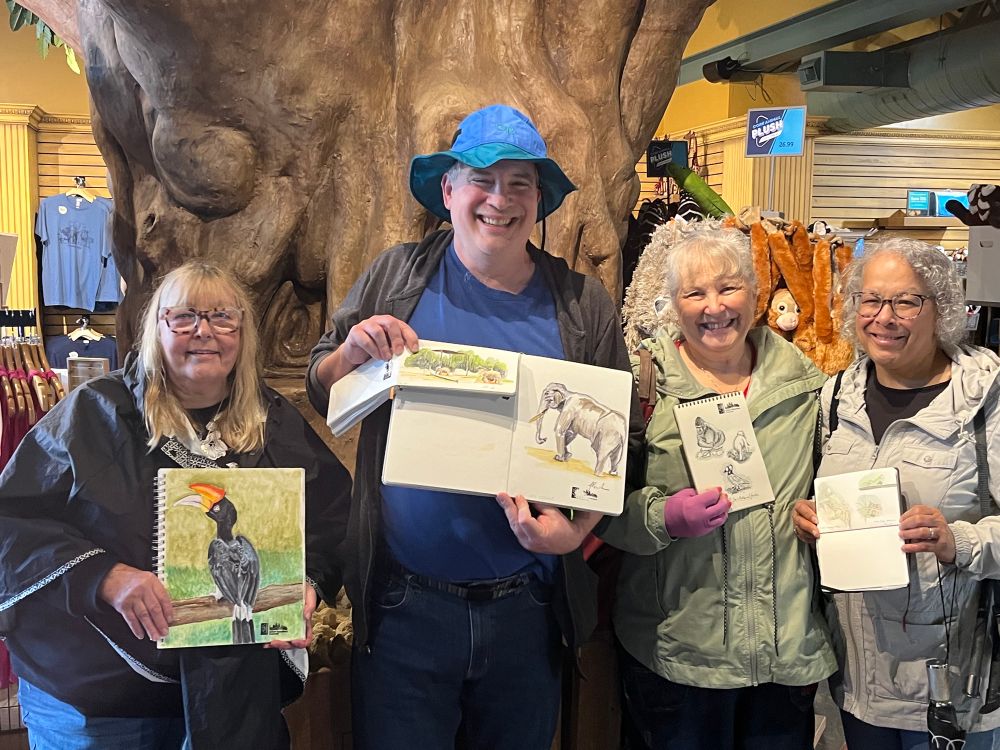 The four brave souls who came to sketch at the zoo in the pouring rain!