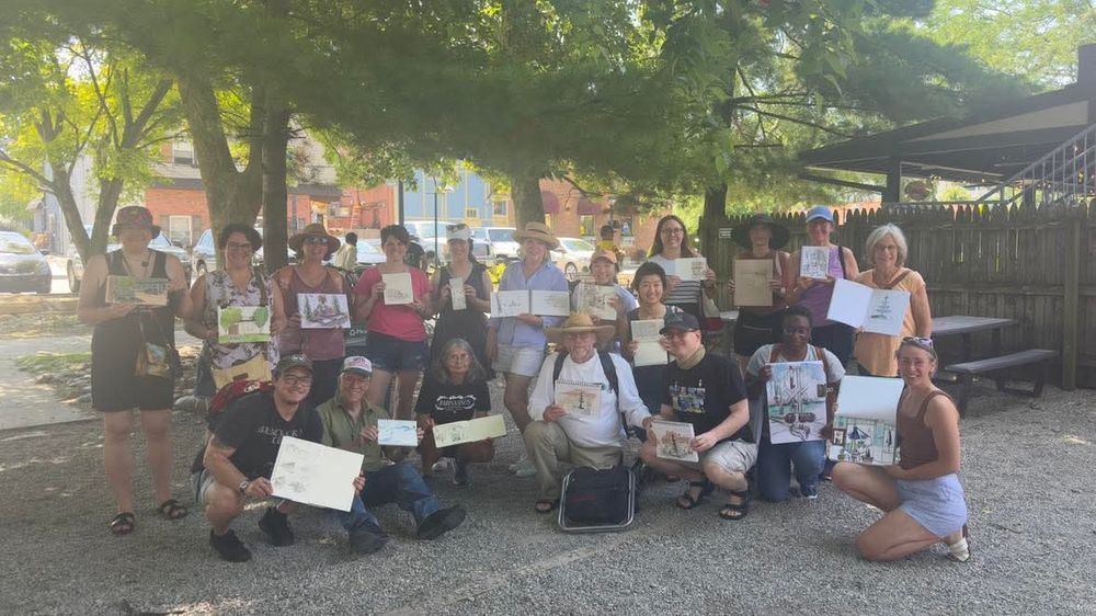 Urban Sketchers Cincinnati shows off their sketches at the Throwdown in Loveland historic district. 