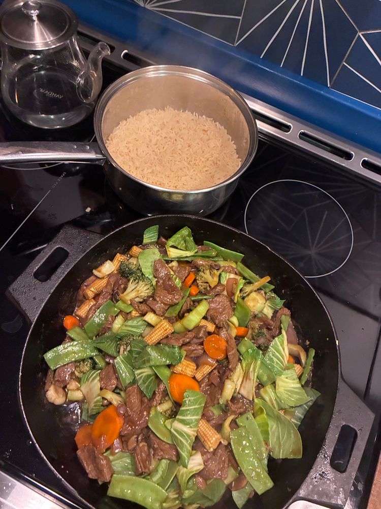 pot of rice and a veggie beef stir fry