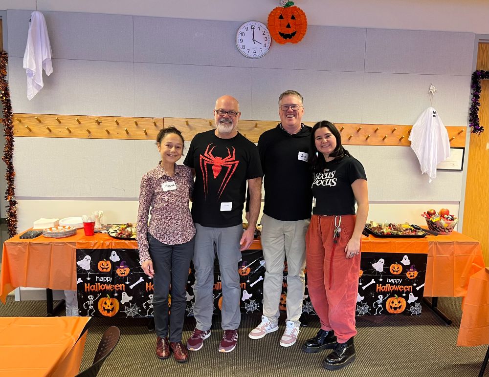 BE "dream team" of 4 folks standing arm in arm in front of the food table at opening time (4pm on the button) - hosted 78 folks, had a swag raffle, HW costume photo slideshow, food, beer, wine and NA drinks for all.