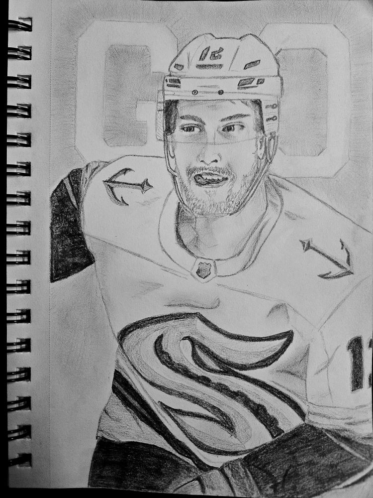 Torso, pencil drawing. Karts with his tongue sticking out, skating toward viewer. The word GO is behind him in relief. 